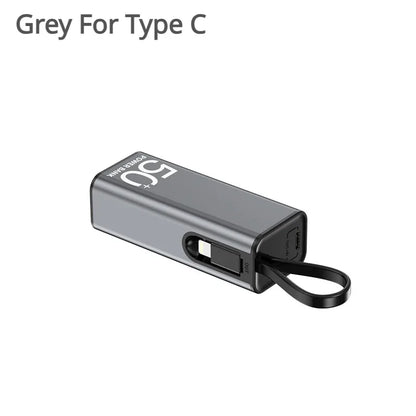 Mini Power Bank 5 000 mAh - Câble Intégré - LED - Ultra-compact